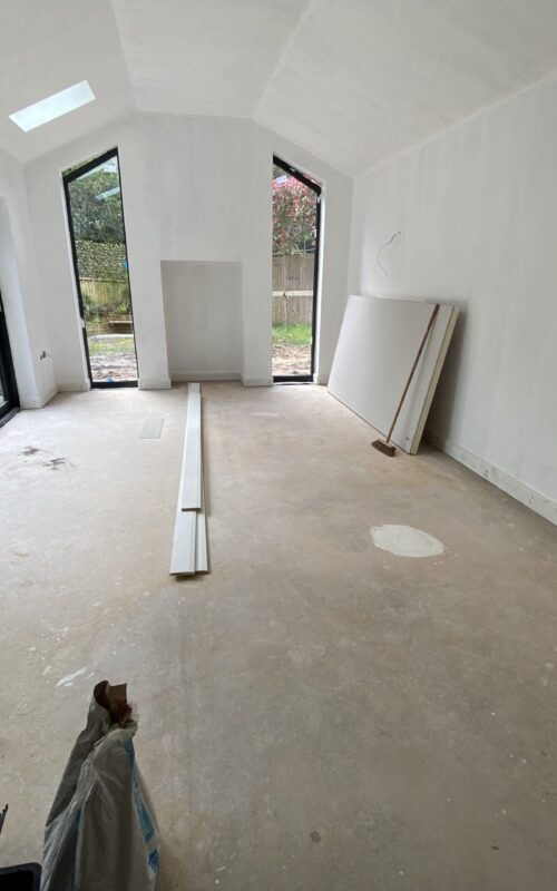 Skirting boards installation on a new open plan kitchen diner extension