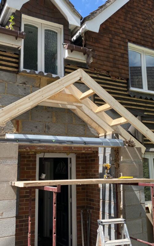 New porch roof built on a new porch build