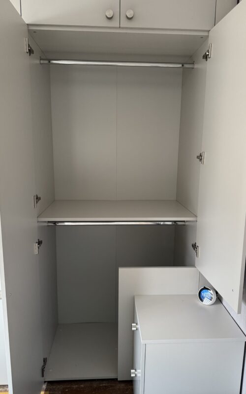 Built in wardrobe including hanging rails.